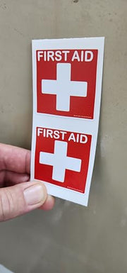 Red and white 2 x 2 inch First Aid label two pack