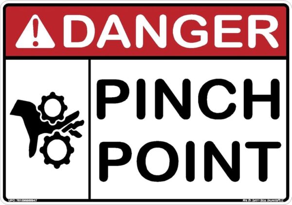 A danger sign with pincer point written underneath it.