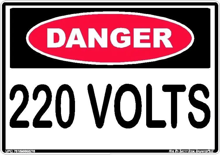 A danger sign that says " 2 0 volt ".